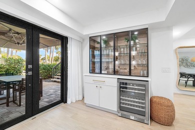 Unparalleled lake and golf course vistas set the stage for this on Quail Ridge Golf Course and Country Club in Florida - for sale on GolfHomes.com, golf home, golf lot