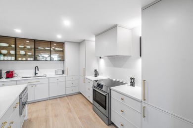 Unparalleled lake and golf course vistas set the stage for this on Quail Ridge Golf Course and Country Club in Florida - for sale on GolfHomes.com, golf home, golf lot