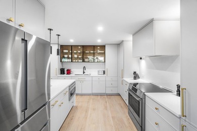 Unparalleled lake and golf course vistas set the stage for this on Quail Ridge Golf Course and Country Club in Florida - for sale on GolfHomes.com, golf home, golf lot