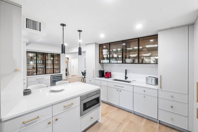 Unparalleled lake and golf course vistas set the stage for this on Quail Ridge Golf Course and Country Club in Florida - for sale on GolfHomes.com, golf home, golf lot