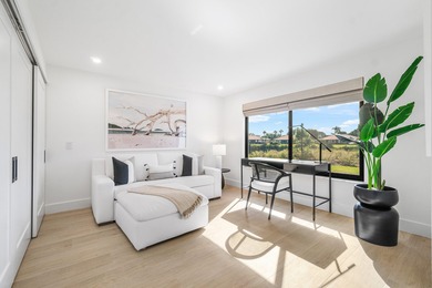 Unparalleled lake and golf course vistas set the stage for this on Quail Ridge Golf Course and Country Club in Florida - for sale on GolfHomes.com, golf home, golf lot