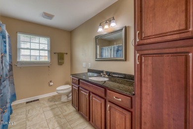 Welcome to this beautifully maintained 4-bedroom, 2-bathroom on Country Club of Bristol in Tennessee - for sale on GolfHomes.com, golf home, golf lot