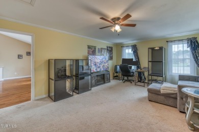 Welcome to this beautifully maintained 4-bedroom, 2-bathroom on Country Club of Bristol in Tennessee - for sale on GolfHomes.com, golf home, golf lot