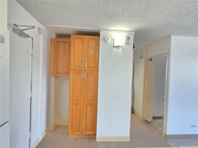 Enjoy the quiet and calm view of the mountains and the golf on Honolulu Country Club in Hawaii - for sale on GolfHomes.com, golf home, golf lot