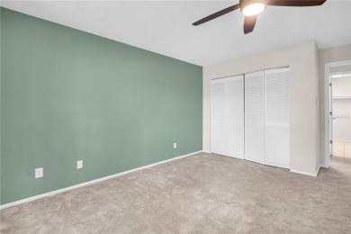 This spacious end-unit villa with serene golf course views is on Highland Lakes Executive Golf Course in Florida - for sale on GolfHomes.com, golf home, golf lot