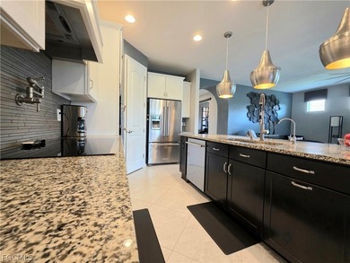 Welcome to elevated Southwest Florida living in this beautifully on The Plantation Golf and Country Club in Florida - for sale on GolfHomes.com, golf home, golf lot