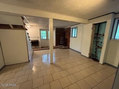 A little elbow grease and your finishing touches will provide on The Hideout Golf in Pennsylvania - for sale on GolfHomes.com, golf home, golf lot