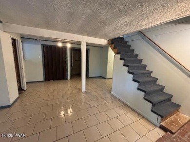 A little elbow grease and your finishing touches will provide on The Hideout Golf in Pennsylvania - for sale on GolfHomes.com, golf home, golf lot