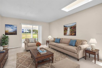 This spacious end-unit villa with serene golf course views is on Highland Lakes Executive Golf Course in Florida - for sale on GolfHomes.com, golf home, golf lot