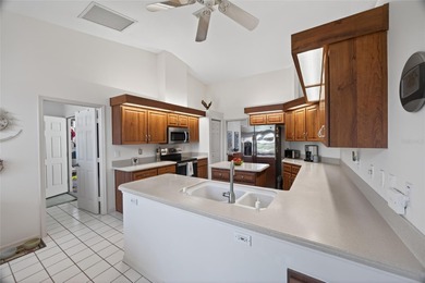 One or more photo(s) has been virtually staged. Step inside this on Royal Oaks Golf Club in Florida - for sale on GolfHomes.com, golf home, golf lot