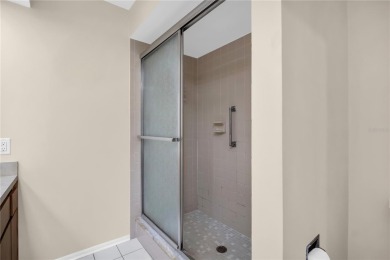 This spacious end-unit villa with serene golf course views is on Highland Lakes Executive Golf Course in Florida - for sale on GolfHomes.com, golf home, golf lot
