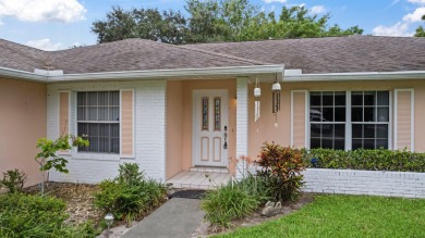 Nice family home on a corner lot that backs up to the golf on Island Pines Golf Club in Florida - for sale on GolfHomes.com, golf home, golf lot