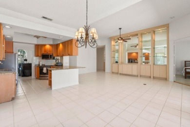 Welcome to 8232 SE Palm Hammock Lane, a meticulously maintained on Lost Lake Golf Club in Florida - for sale on GolfHomes.com, golf home, golf lot