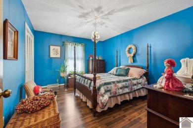 Charming three bedroom/2 bath house located in Country Club on Mayfield-Graves Country Club in Kentucky - for sale on GolfHomes.com, golf home, golf lot