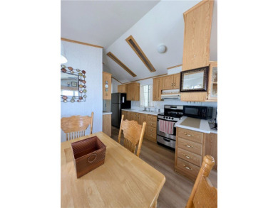 Fabulous home. Covered parking. No one behind you which gives on Riverview Golf Course in Arizona - for sale on GolfHomes.com, golf home, golf lot