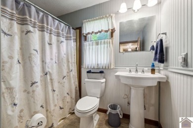 Charming three bedroom/2 bath house located in Country Club on Mayfield-Graves Country Club in Kentucky - for sale on GolfHomes.com, golf home, golf lot