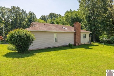 Charming three bedroom/2 bath house located in Country Club on Mayfield-Graves Country Club in Kentucky - for sale on GolfHomes.com, golf home, golf lot