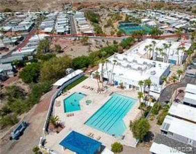 Fabulous home. Covered parking. No one behind you which gives on Riverview Golf Course in Arizona - for sale on GolfHomes.com, golf home, golf lot