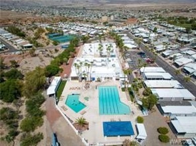 Fabulous home. Covered parking. No one behind you which gives on Riverview Golf Course in Arizona - for sale on GolfHomes.com, golf home, golf lot
