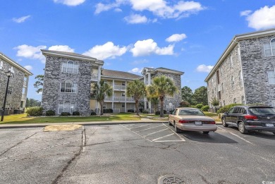 Must see! This stunning first-floor, 2-bedroom, 2-bathroom end on Myrtlewood Golf Course and Club  in South Carolina - for sale on GolfHomes.com, golf home, golf lot