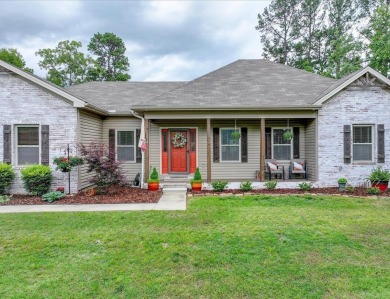Welcome to this beautifully updated 3-bedroom, 2-bath home on Diamondhead Golf and Country Club in Arkansas - for sale on GolfHomes.com, golf home, golf lot