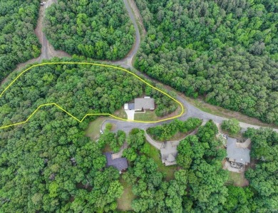 Welcome to this beautifully updated 3-bedroom, 2-bath home on Diamondhead Golf and Country Club in Arkansas - for sale on GolfHomes.com, golf home, golf lot