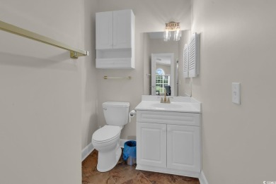 Must see! This stunning first-floor, 2-bedroom, 2-bathroom end on Myrtlewood Golf Course and Club  in South Carolina - for sale on GolfHomes.com, golf home, golf lot