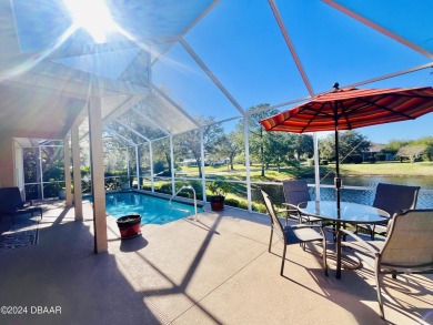 Unwind by the pool in your Plantation Bay Oasis! Escape the on Plantation Bay Golf and Country Club in Florida - for sale on GolfHomes.com, golf home, golf lot