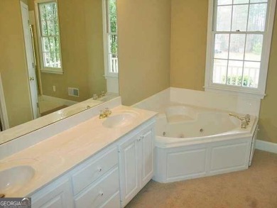 Charming 5 bedroom/4.5 bath Cape Cod-style home in Snellville's on Country Club of Gwinnett in Georgia - for sale on GolfHomes.com, golf home, golf lot