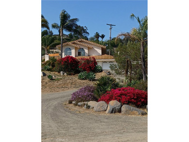 HILLTOP EQUESTRIAN PROPERTY with DISTANT OCEAN VIEWS This on Pala Mesa Resort in California - for sale on GolfHomes.com, golf home, golf lot