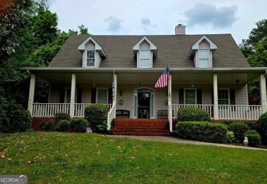 Charming 5 bedroom/4.5 bath Cape Cod-style home in Snellville's on Country Club of Gwinnett in Georgia - for sale on GolfHomes.com, golf home, golf lot