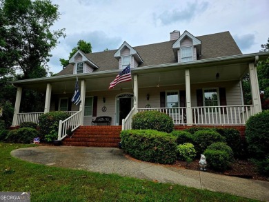 Charming 5 bedroom/4.5 bath Cape Cod-style home in Snellville's on Country Club of Gwinnett in Georgia - for sale on GolfHomes.com, golf home, golf lot
