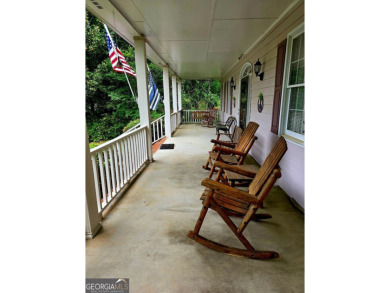 Charming 5 bedroom/4.5 bath Cape Cod-style home in Snellville's on Country Club of Gwinnett in Georgia - for sale on GolfHomes.com, golf home, golf lot