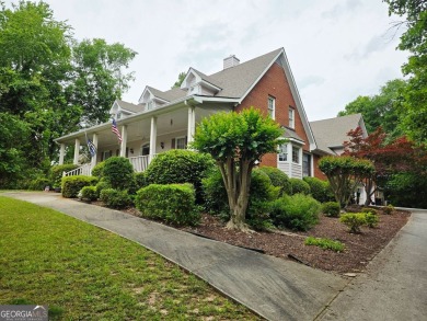 Charming 5 bedroom/4.5 bath Cape Cod-style home in Snellville's on Country Club of Gwinnett in Georgia - for sale on GolfHomes.com, golf home, golf lot
