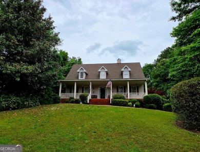 Charming 5 bedroom/4.5 bath Cape Cod-style home in Snellville's on Country Club of Gwinnett in Georgia - for sale on GolfHomes.com, golf home, golf lot