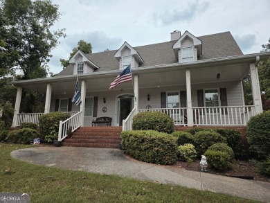 Charming 5 bedroom/4.5 bath Cape Cod-style home in Snellville's on Country Club of Gwinnett in Georgia - for sale on GolfHomes.com, golf home, golf lot