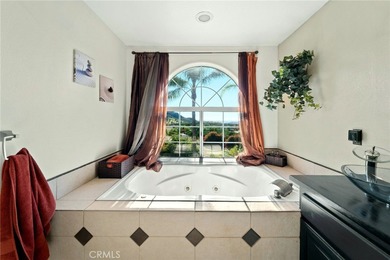 HILLTOP EQUESTRIAN PROPERTY with DISTANT OCEAN VIEWS This on Pala Mesa Resort in California - for sale on GolfHomes.com, golf home, golf lot