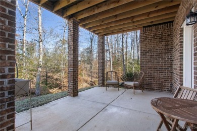 Step into this like-new home at 18030 Creek Cove Drive, where on The Westham Golf Club At Magnolia Green in Virginia - for sale on GolfHomes.com, golf home, golf lot