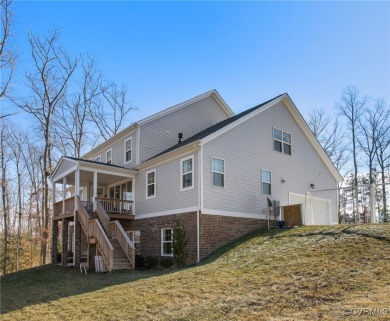 Step into this like-new home at 18030 Creek Cove Drive, where on The Westham Golf Club At Magnolia Green in Virginia - for sale on GolfHomes.com, golf home, golf lot