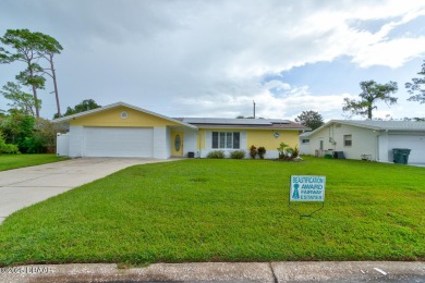 A GREAT home begins with GREAT curb appeal! This home is a on Daytona Beach Golf Club in Florida - for sale on GolfHomes.com, golf home, golf lot
