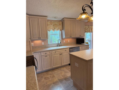 This lovely, TURNKEY manufactured 2 bdr, 2bath home located on a on Pine Lakes Country Club in Florida - for sale on GolfHomes.com, golf home, golf lot