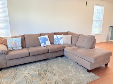Charming Coastal Retreat Awaits in Sunset Beach

Experience on Sandpiper Bay Golf and Country Club in North Carolina - for sale on GolfHomes.com, golf home, golf lot