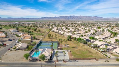 Priced to sell and waiting for new owners to call home. Located on Desert Lakes Golf Course in Arizona - for sale on GolfHomes.com, golf home, golf lot