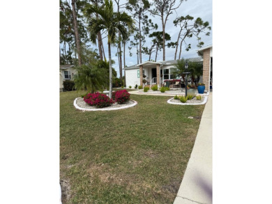 This lovely, TURNKEY manufactured 2 bdr, 2bath home located on a on Pine Lakes Country Club in Florida - for sale on GolfHomes.com, golf home, golf lot