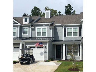 Experience coastal living in this stunning 5 bedroom 3.5 bath on Barefoot Resort and Golf Club  in South Carolina - for sale on GolfHomes.com, golf home, golf lot