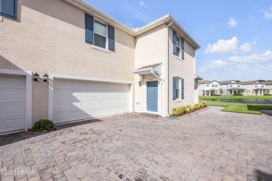 You'll love coming home to this stunning 2023-built waterfront on Venetian Bay Golf Course in Florida - for sale on GolfHomes.com, golf home, golf lot