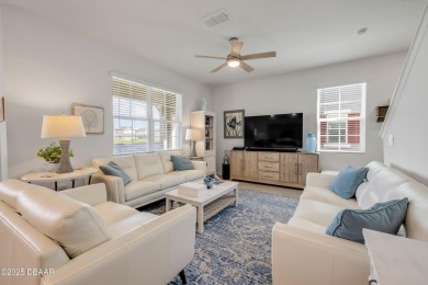 You'll love coming home to this stunning 2023-built waterfront on Venetian Bay Golf Course in Florida - for sale on GolfHomes.com, golf home, golf lot