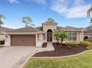 Discover luxury living in this exquisite 2,254-square-foot on Ridgewood Lakes Golf and Country Club in Florida - for sale on GolfHomes.com, golf home, golf lot