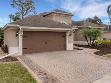 Discover luxury living in this exquisite 2,254-square-foot on Ridgewood Lakes Golf and Country Club in Florida - for sale on GolfHomes.com, golf home, golf lot