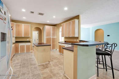 This spacious, 4-bedroom home offers an open floor plan for the on Carolina Shores Golf Course in North Carolina - for sale on GolfHomes.com, golf home, golf lot